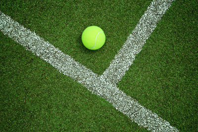 High angle view of tennis ball on field in court