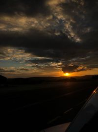 Scenic view of landscape against sky during sunset