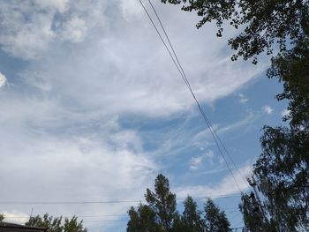 Low angle view of vapor trail against sky