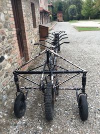 Bicycle parked by building