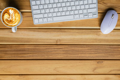 Directly above shot of coffee cup on table