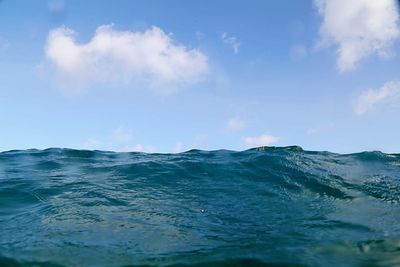 Scenic view of sea against blue sky