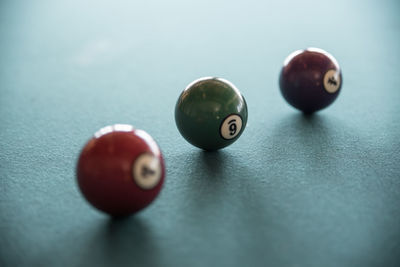 Close-up of pool balls on table