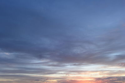 Low angle view of cloudy sky during sunset