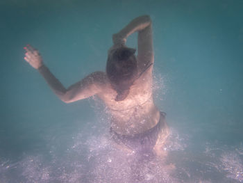 Woman swimming in water