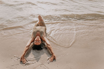 High angle view of woman on beach