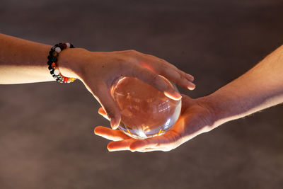 Close-up of hand holding ice cream