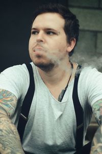 Portrait of young man looking away