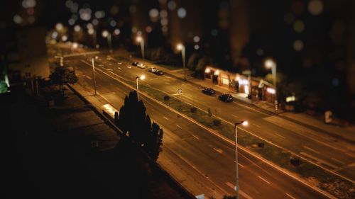 Vehicles on road at night