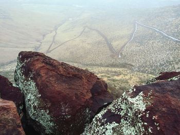 High angle view of rock formation in sea