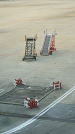 High angle view of deck chairs on floor