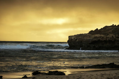 Scenic view of sea against sky during sunset