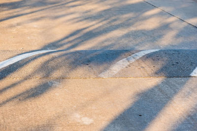 High angle view of shadow on sand