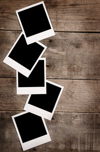 High angle view of photographs on table