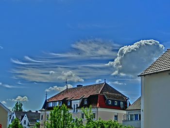 Houses against blue sky