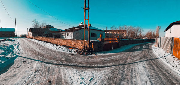 Panoramic view of buildings against clear sky