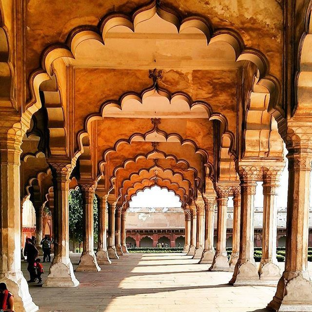 architecture, the way forward, built structure, arch, in a row, architectural column, colonnade, diminishing perspective, indoors, column, vanishing point, corridor, pillar, empty, incidental people, walkway, history, archway, day, repetition