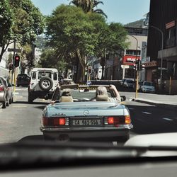 Cars on road in city