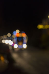 Close-up of illuminated lights at night