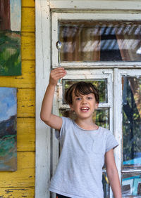 Portrait of girl standing outdoors