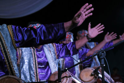 Men with musical instruments in music concert