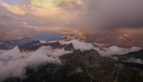 Scenic view of mountains against sky during sunset