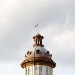 Low angle view of flag against sky