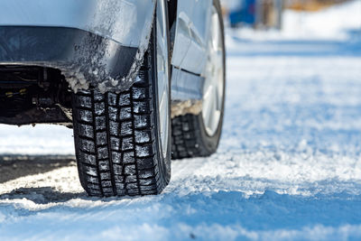 Close-up of tire tracks in snow