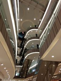 Low angle view of illuminated shopping mall