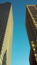 Low angle view of buildings against clear sky