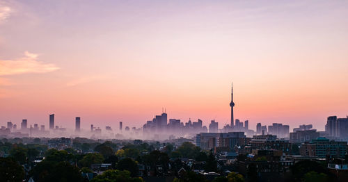 View of buildings against sky during sunset of the toronto skyline