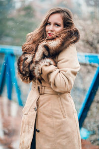 Portrait of young woman in winter