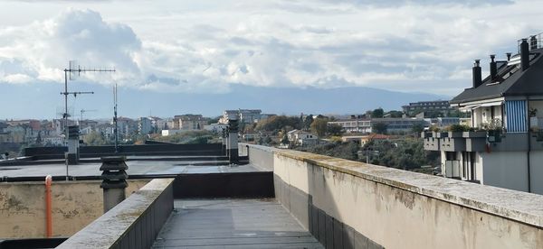 View of buildings in city against sky