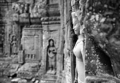 Close-up of statue against temple
