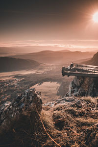 Aerial view of landscape against sky during sunset