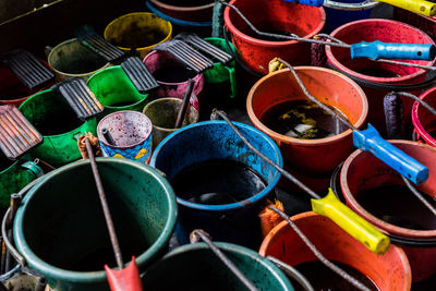 High angle view of colorful buckets