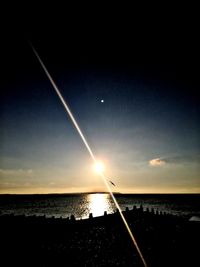 Scenic view of sea against sky at sunset