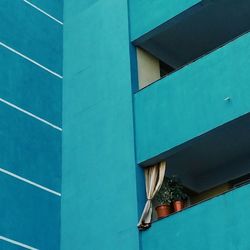 Low angle view of building against blue sky