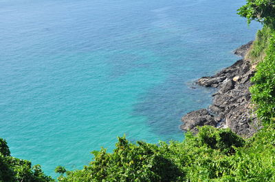 High angle view of bay against clear blue sky