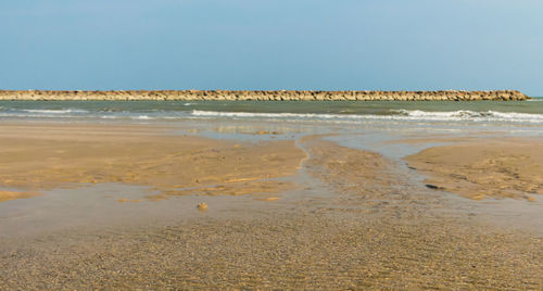 Scenic view of sea against clear sky