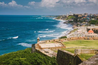 Scenic view of sea by puerto rico against sky