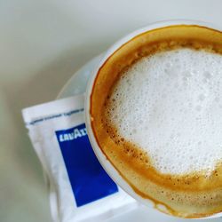 Close-up of coffee cup on table