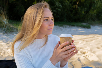 Young woman using mobile phone