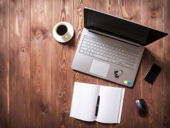 High angle view of coffee cup on table