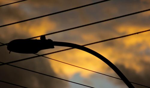 Chainlink fence at sunset