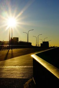 Road against sky at sunset