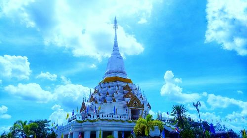 Low angle view of statue against blue sky