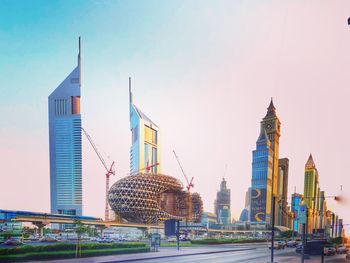 Modern buildings in city against sky