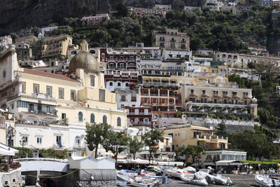 View from beach upwards towards positano, amalfi coast, campania, italy