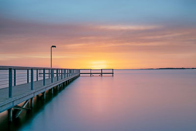 Scenic view of sea against sky at sunset